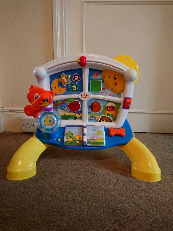 bright starts lights baby learn and giggle activity station